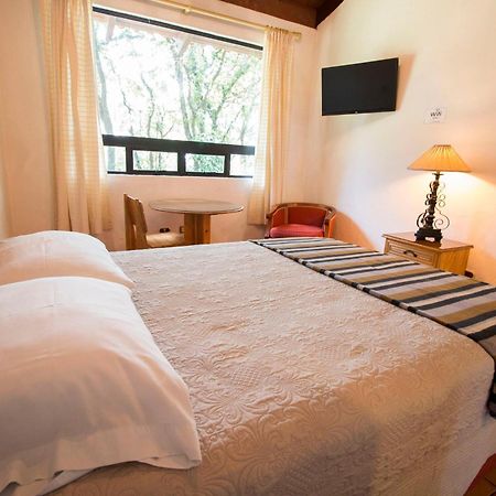Cabaña Suiza El Manzanillo Habitación foto
