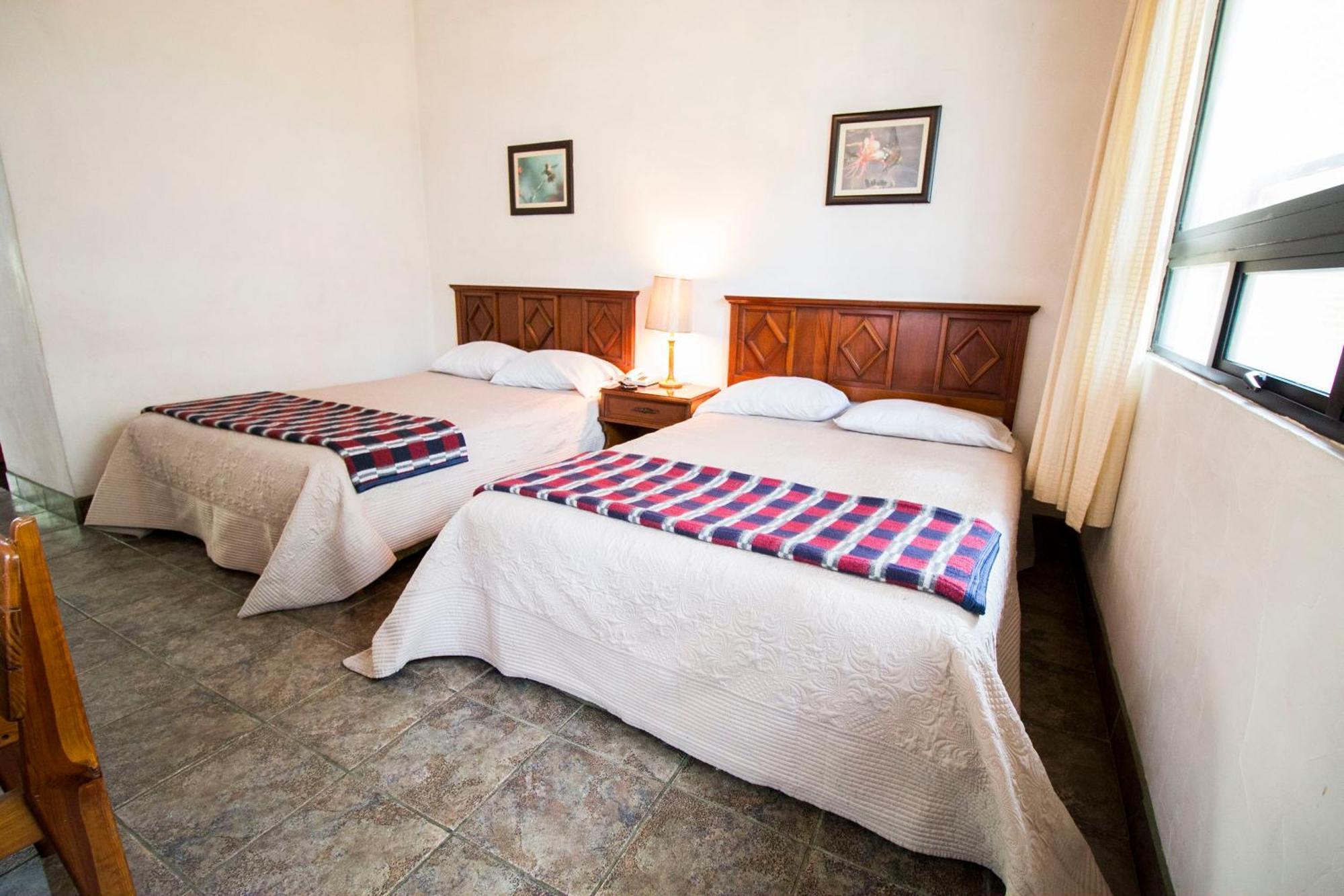 Cabaña Suiza El Manzanillo Habitación foto